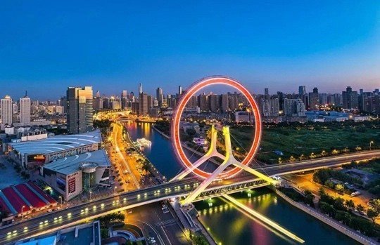 Tianjin at night with the Tianjin Eye